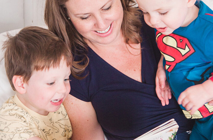 Homeschooling mom settles in with the kids and a picture book